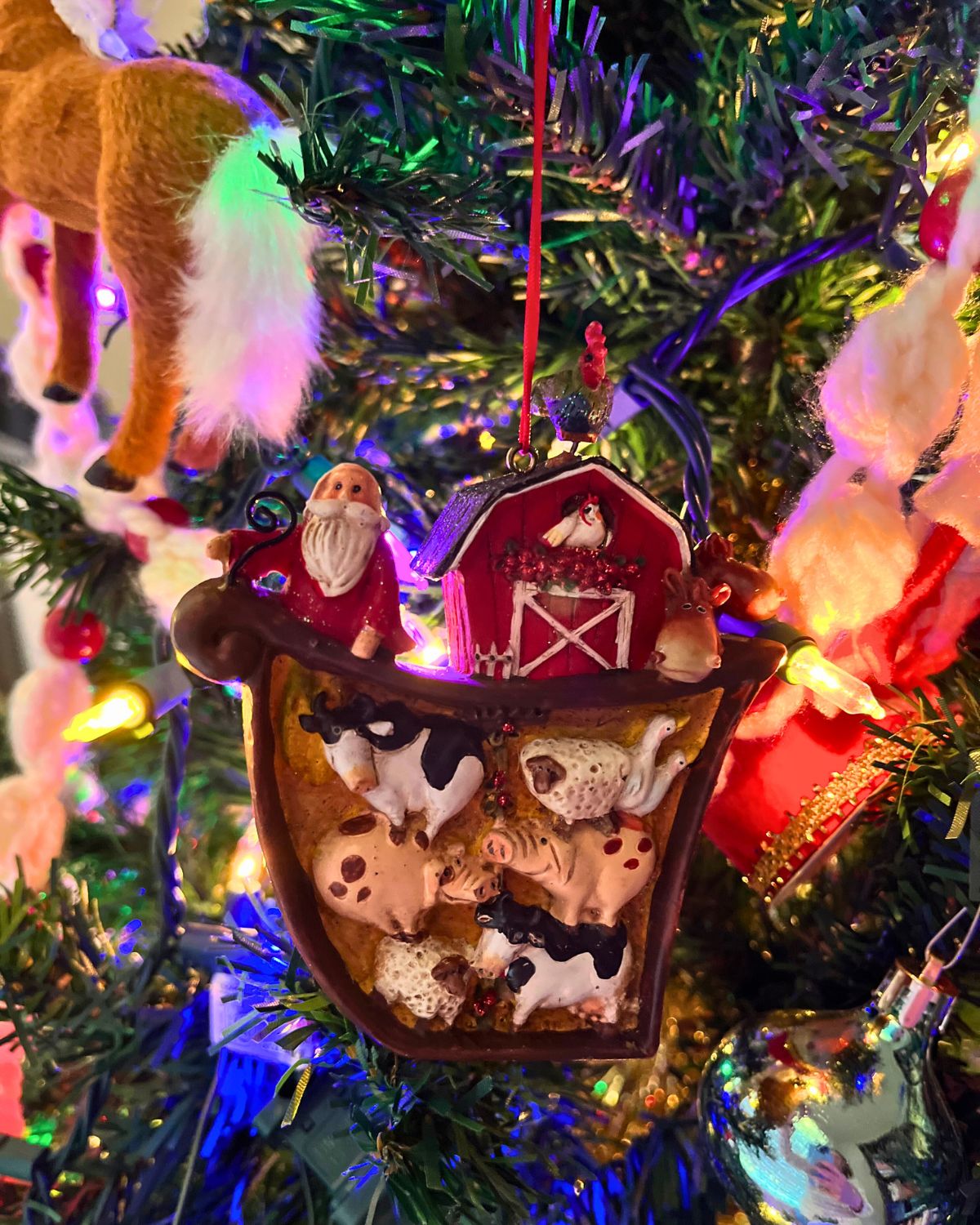 a santa noah in the ark ornament.