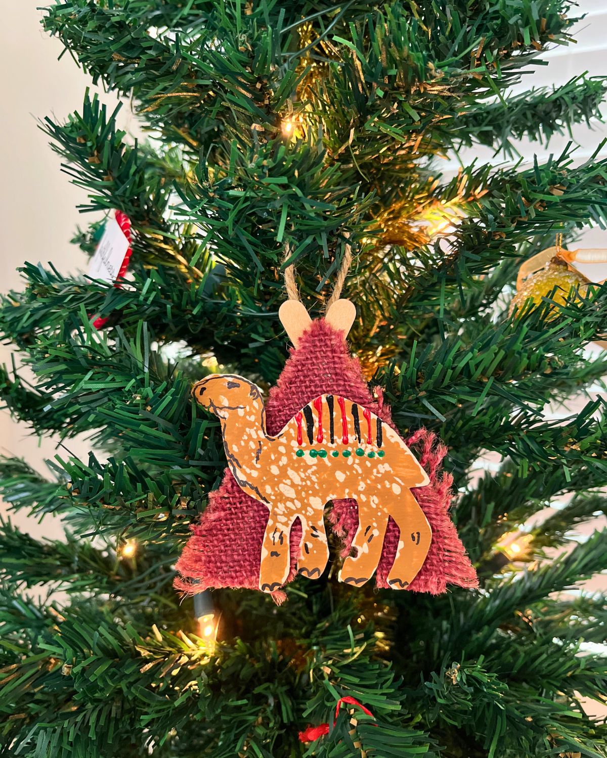 a homemade camel and tent ornament.