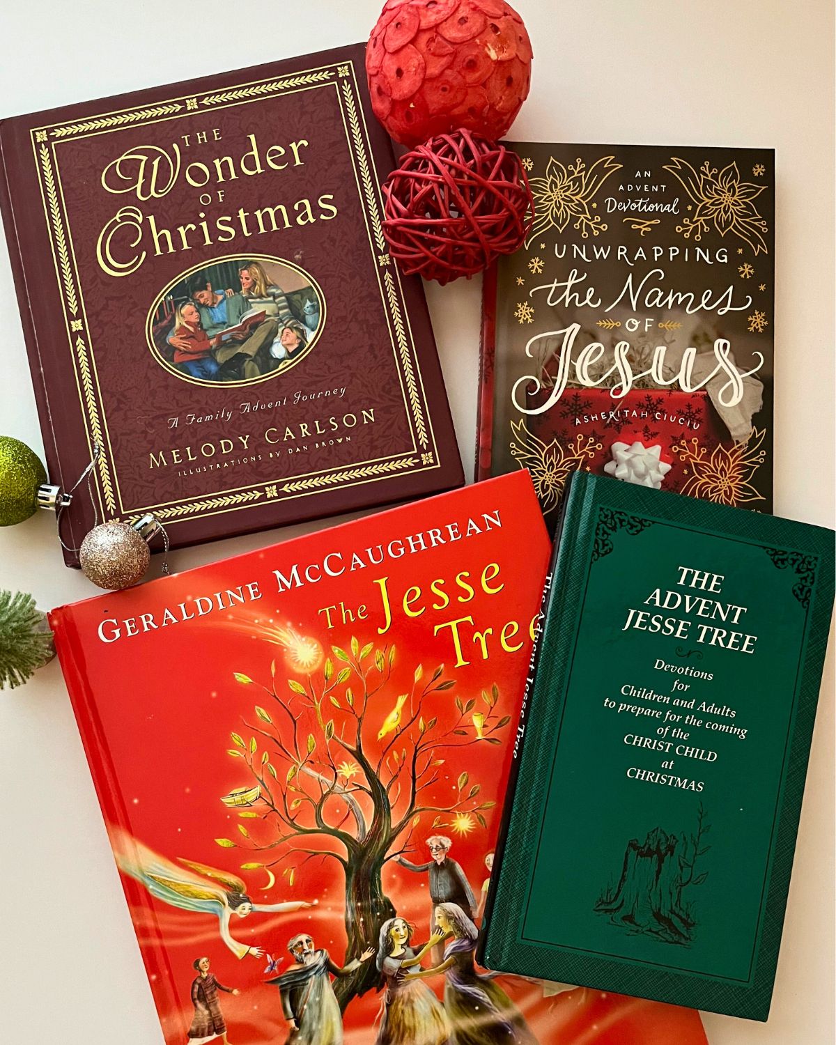 advent and jesse tree books laid out on table.