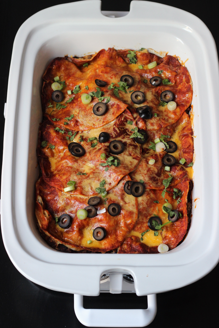 closeup of slow cooker with enchiladas