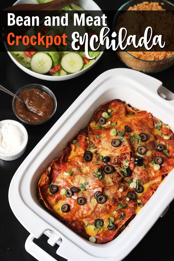 table with casserole crockpot and side dishes