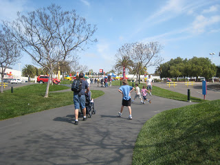 A group of people walking in Legoland.