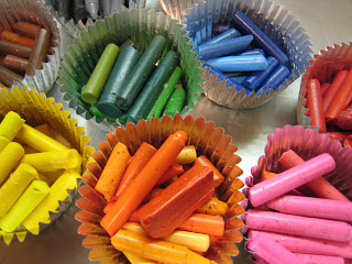 aluminum muffin papers filled with crayons to melt.