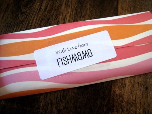A Hershey\'s bars wrapped with striped paper and labeled, With Love from FishMama.