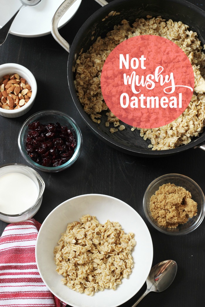 table set with pot of oatmeal and toppings