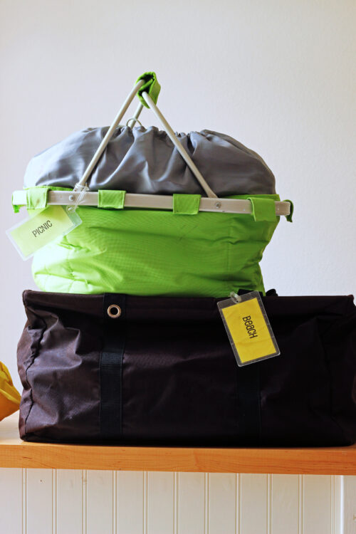 Two activity bags stacked on a counter.