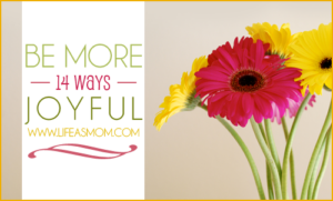 A close up of a flower with text overlay: 14 Ways to Be More Joyful.