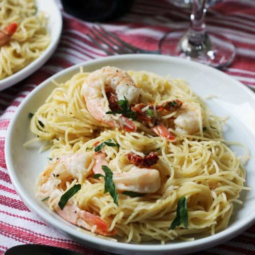 close up of a plate of shrimp pasta.