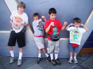 Boys goofing off posing for the camera at Disneyland.