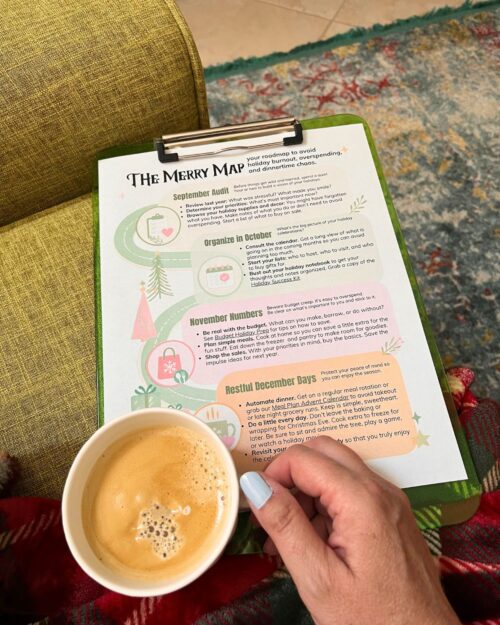 the merry map on a clipboard with a cup of coffee.