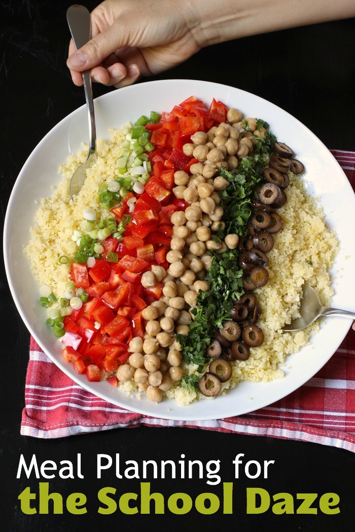 bowl of couscous topped with vegetables