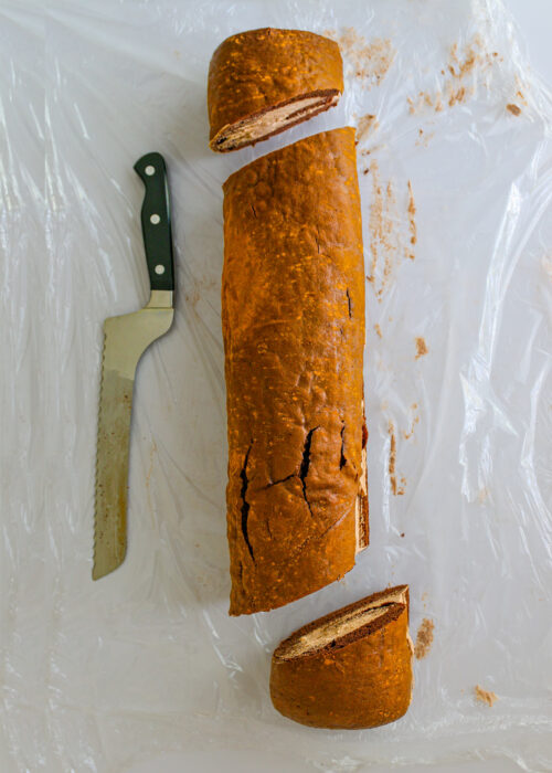 unwrapped cake roll with ends cut off.