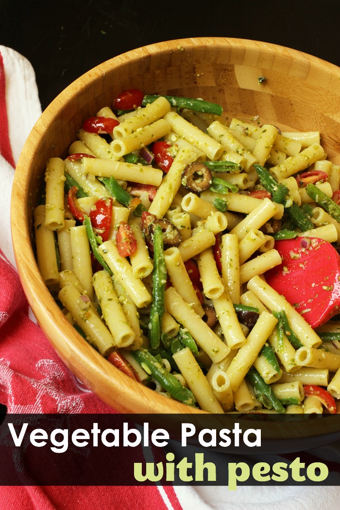 A bowl filled with vegetable pesto pasta salad