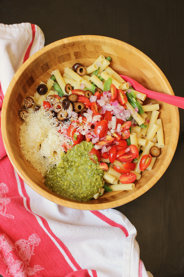 ingredients for vegetable pesto pasta in bowl