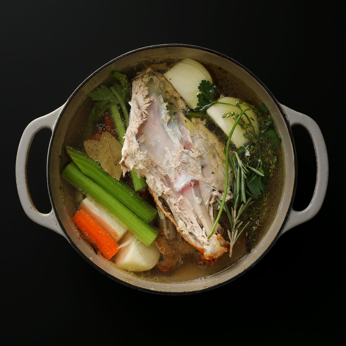 turkey leftovers in dutch oven to make stock.