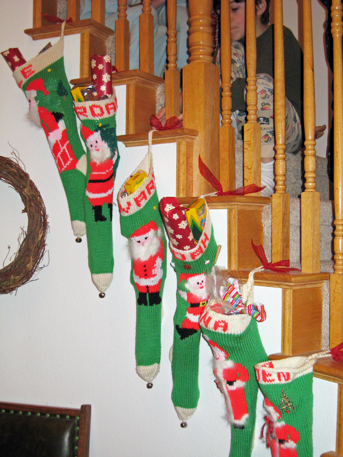 Christmas Stockings hung on banister.