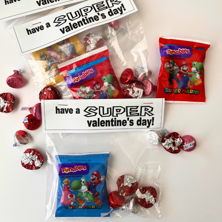 super mario valentine treat bags on white table.