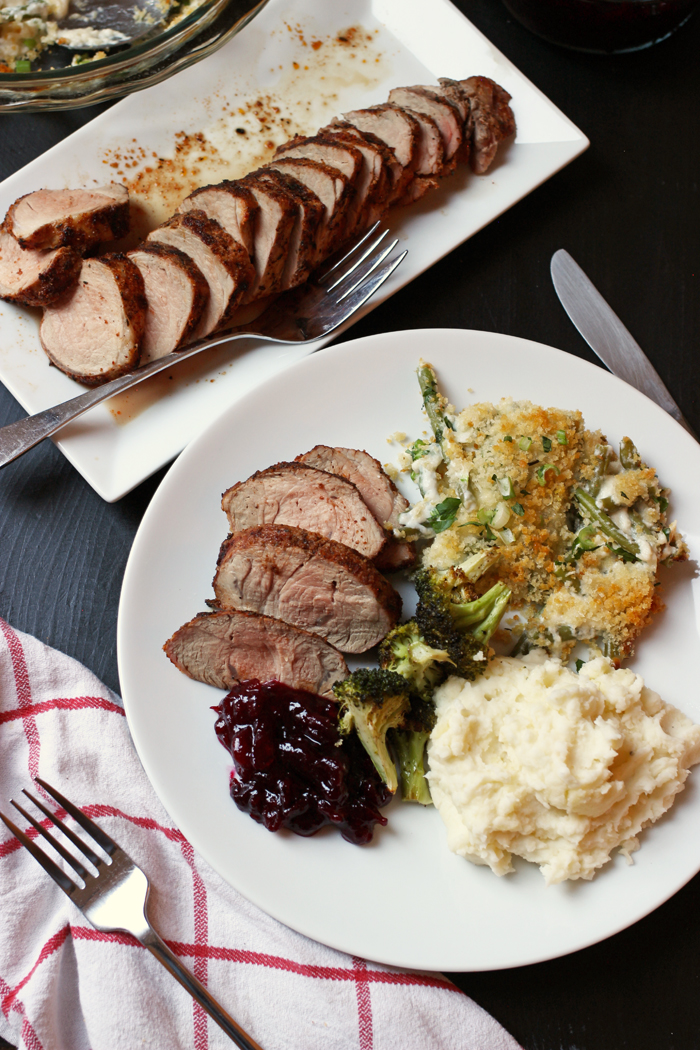 dinner plate with Spice Rubbed Pork Tenderloin & vegetable side dishes