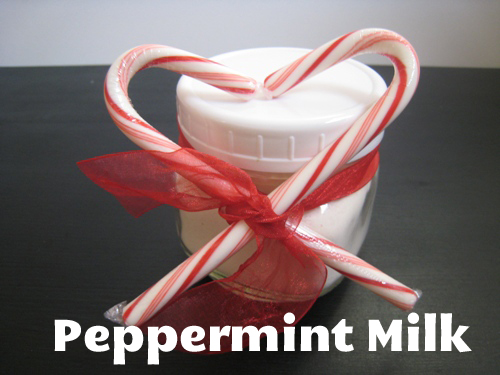 A jar of peppermint milk with crossed candy canes.