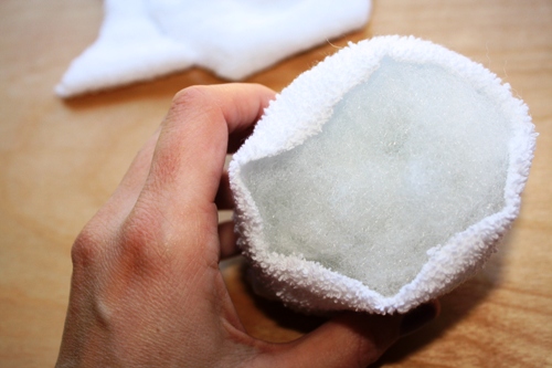 stuffing the sock cut into a snowball.