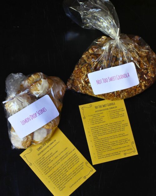 homemade breakfast items with recipe cards printed and next to the labeled bags.