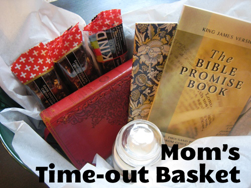 Basket with kind bars, journal, Bible promise book, and candle.