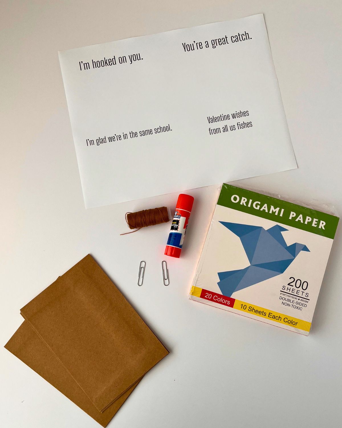 supplies for origami valentine cards.