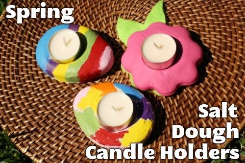 salt dough candle holders in the shapes of eggs and flowers.