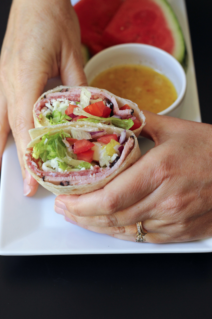 A close up of a person holding a wrap
