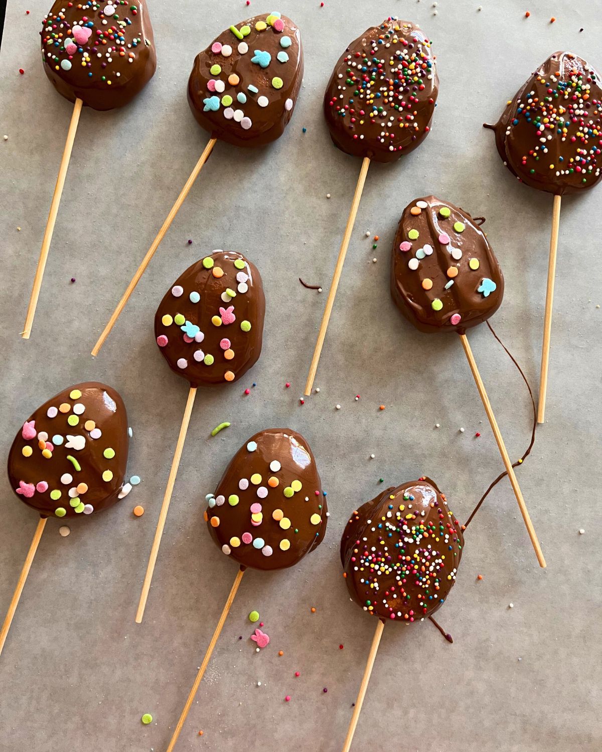 dipped marshmallows on parchment paper.