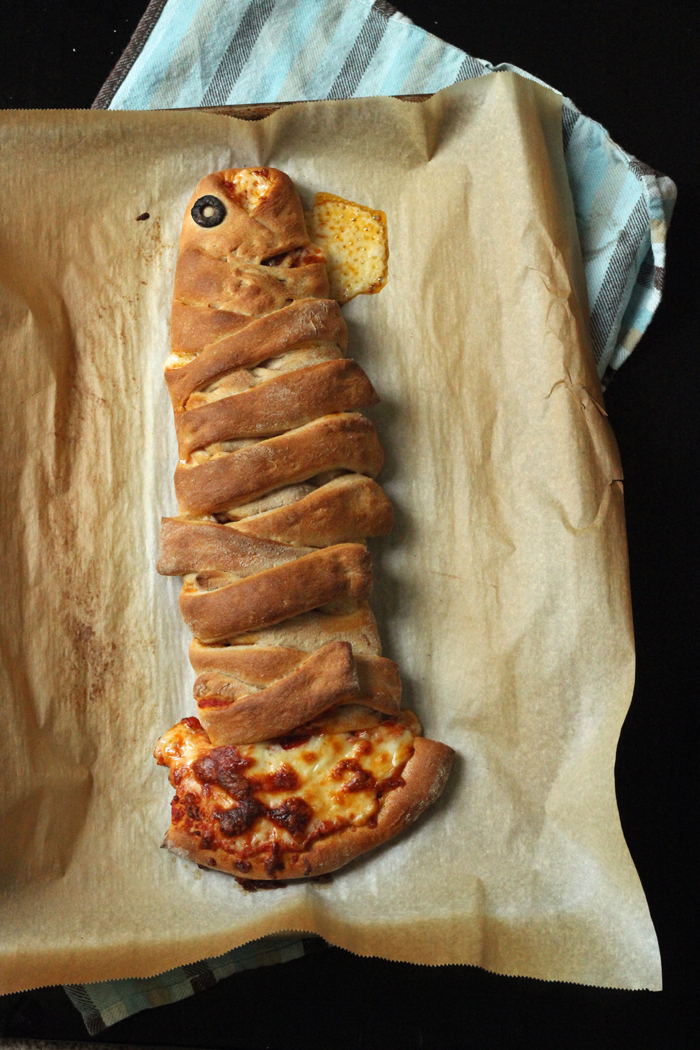 baked fish-shaped calzone on parchment