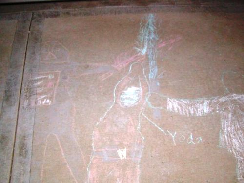 Star Wars characters drawn in chalk on the sidewalk.