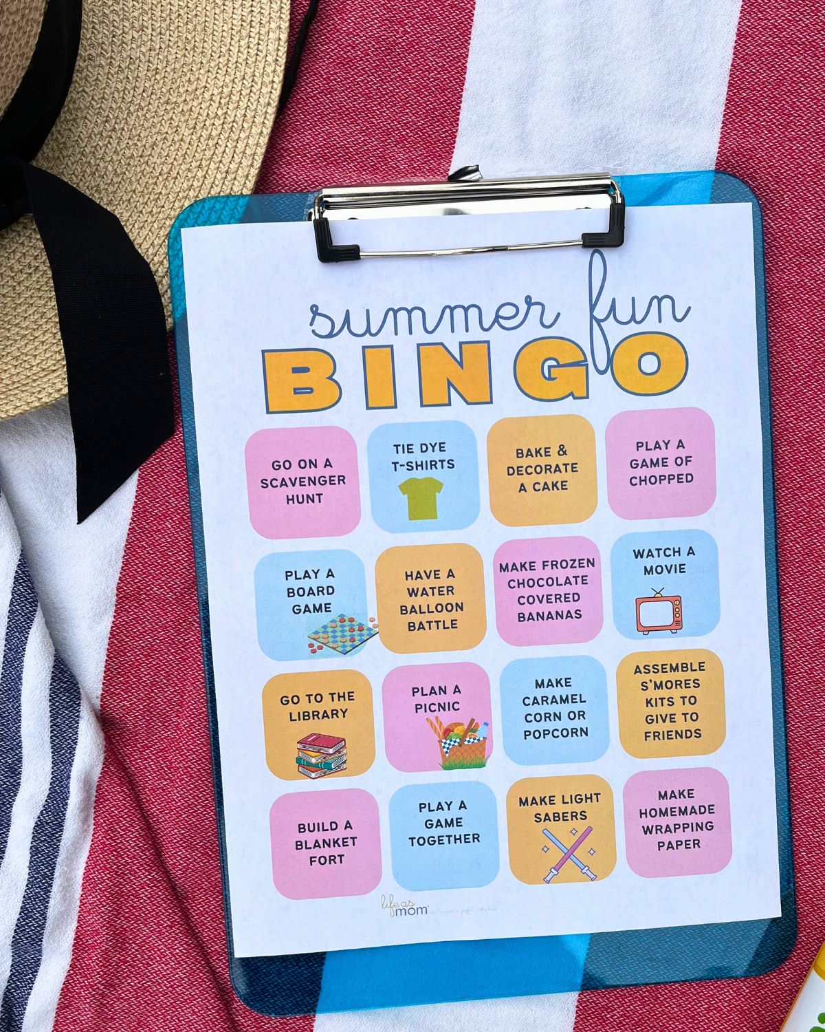 summer fun bingo sheet on clipboard.