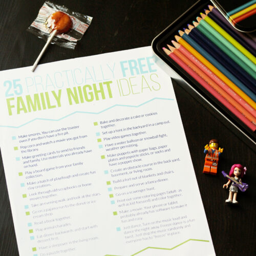Family Nights Ideas Sheet on table with lego person, lollipop, and colored pencils.
