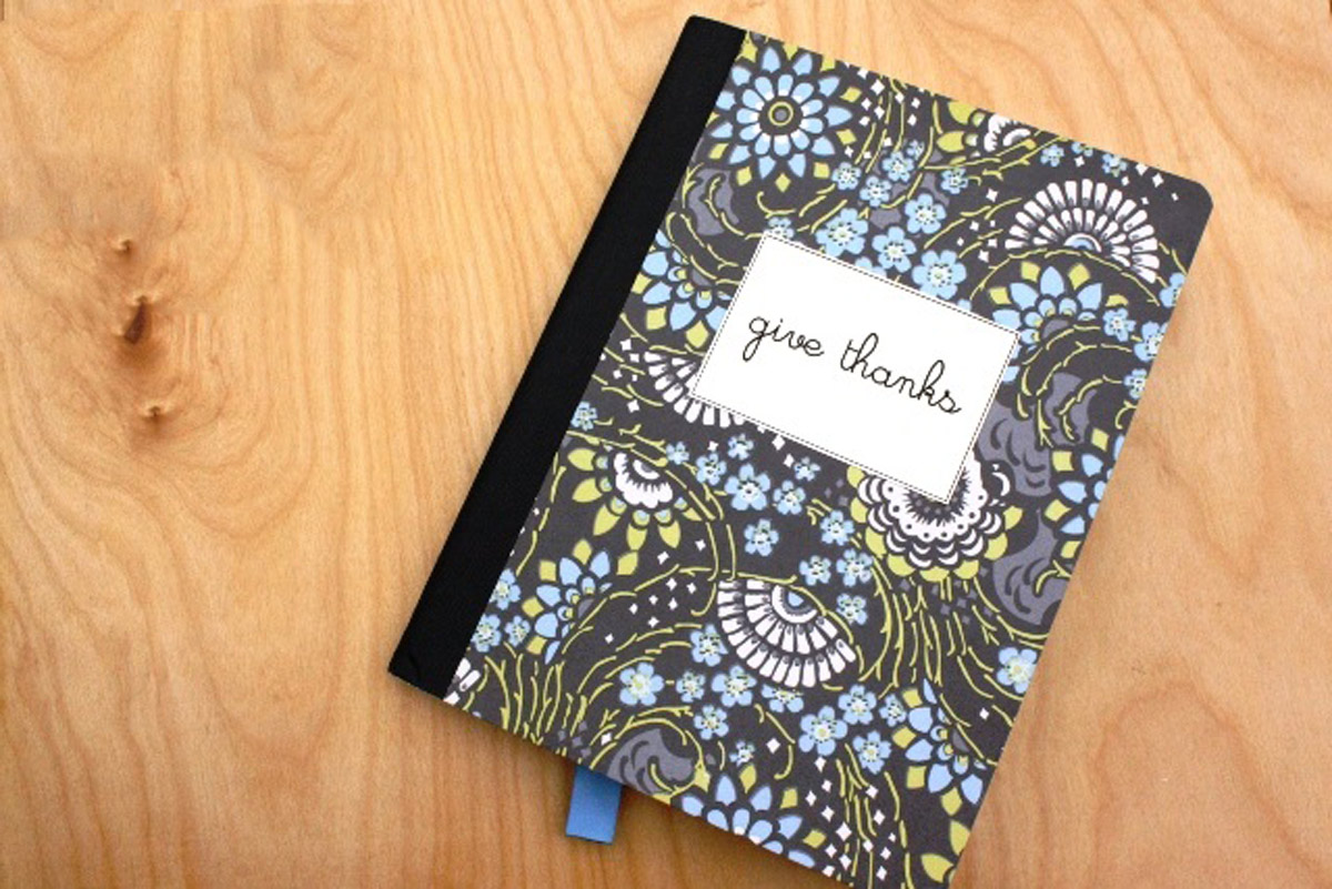 pretty gratitude journal on table top.