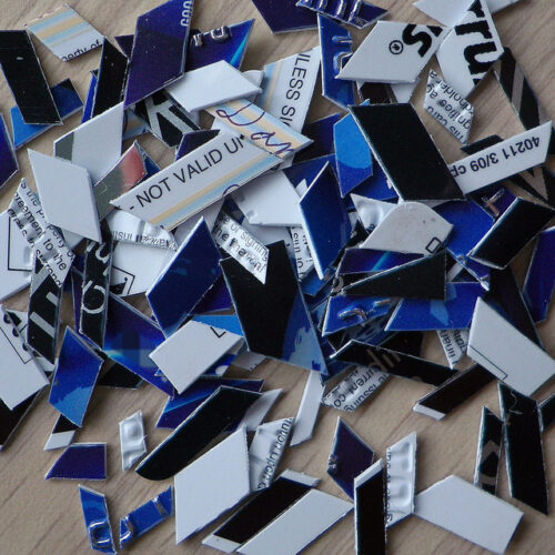 A pile of shredded credit cards.