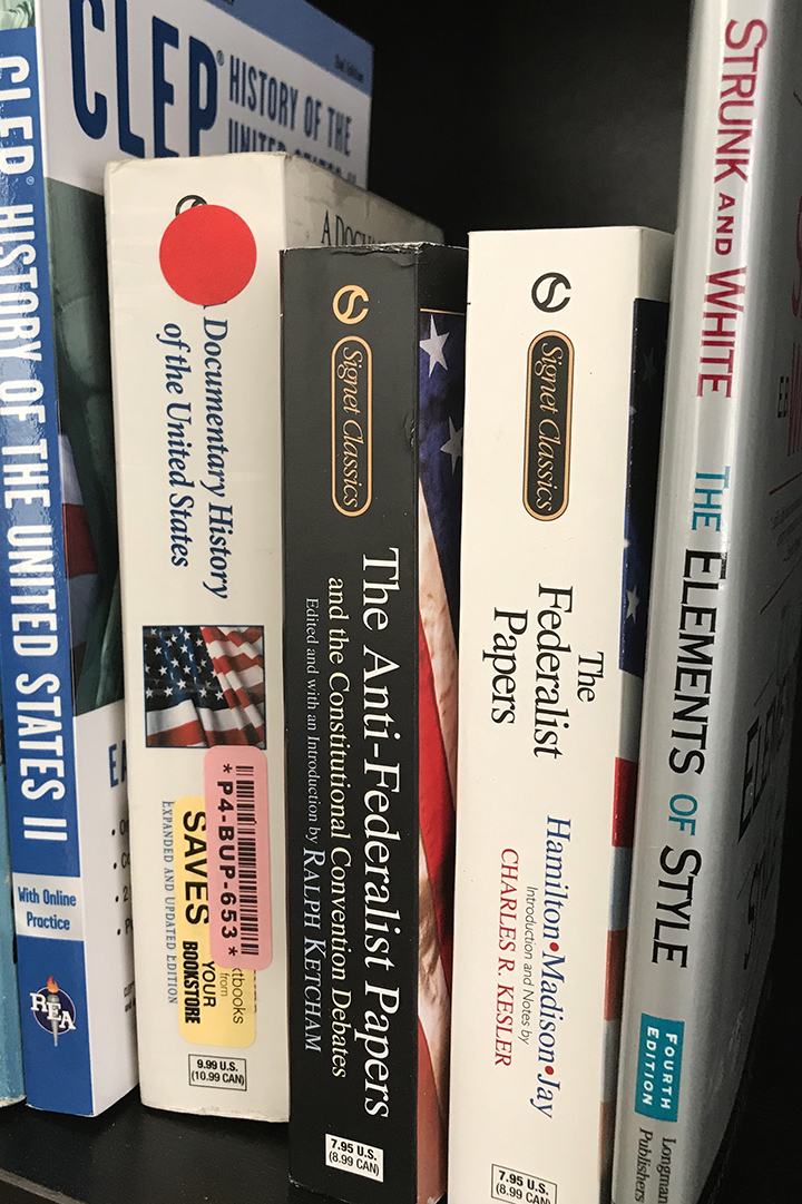 used history and writing books on shelf