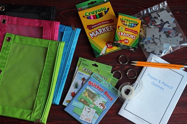 A Busy Book for Kids on the Road - Hitting the road? Need some fun, but quiet activity for little hands? Make a busy book.