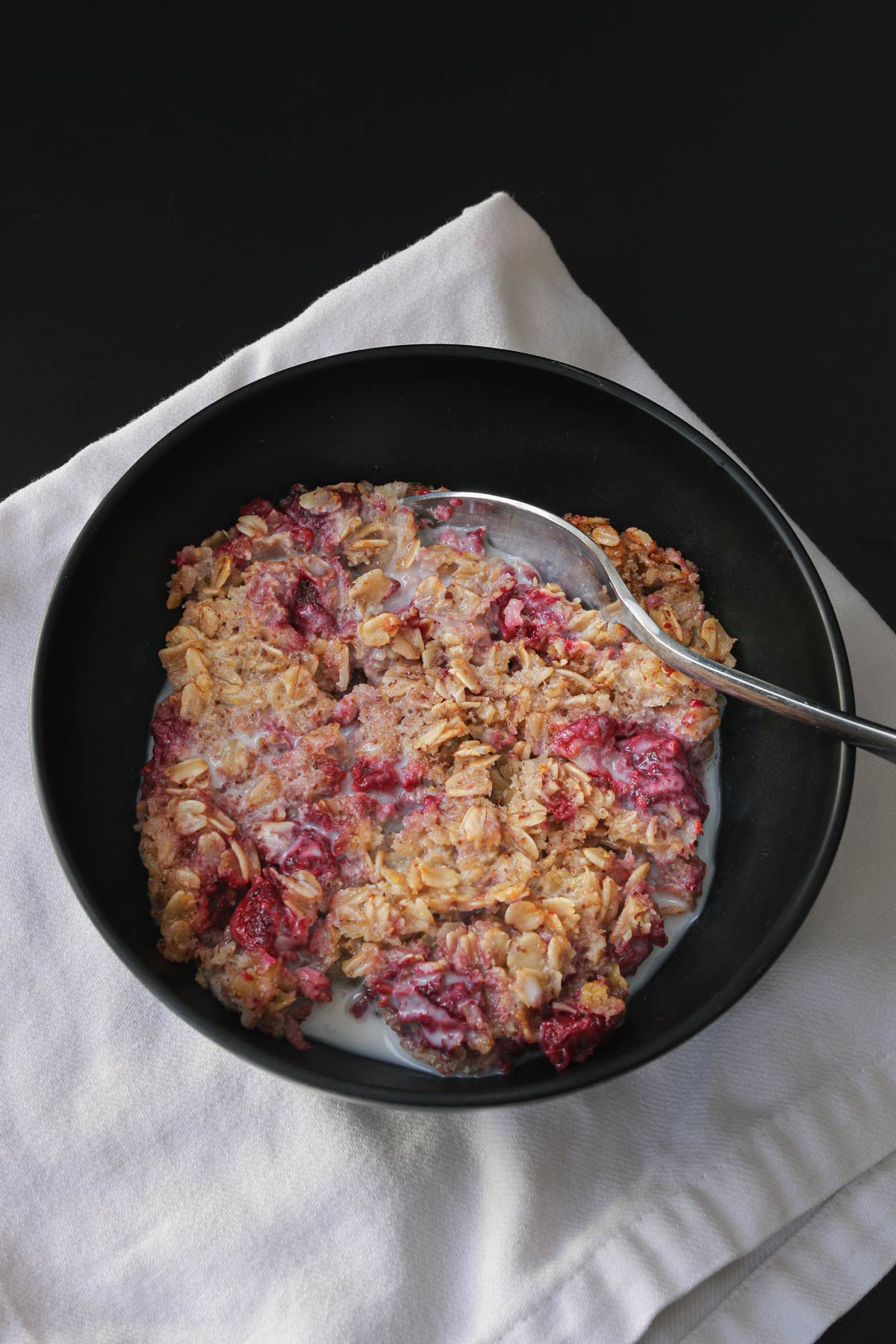 bowl of baked oatmeal with milk.