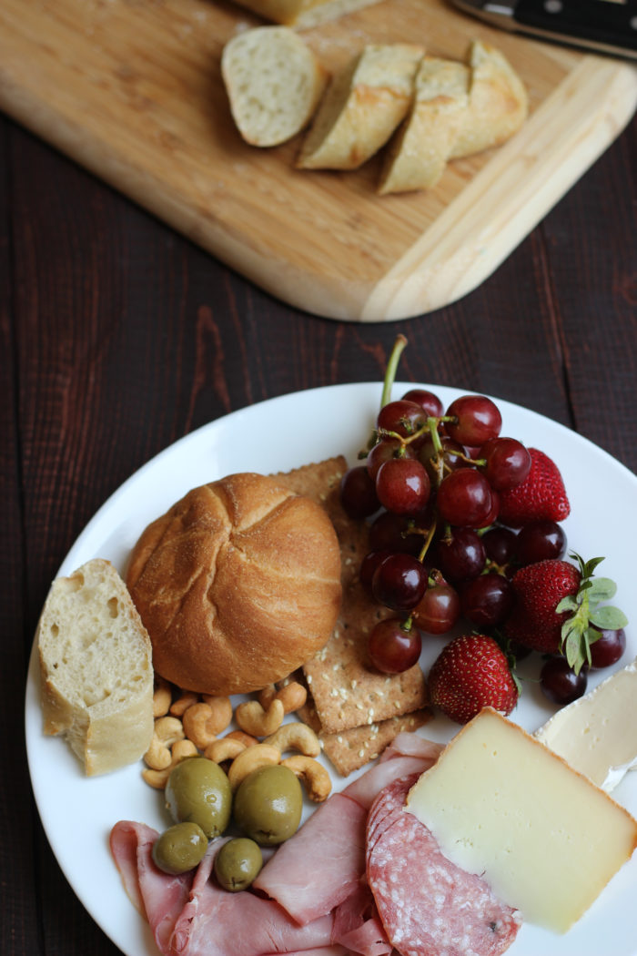 bread on cutting board with snack dinner plate