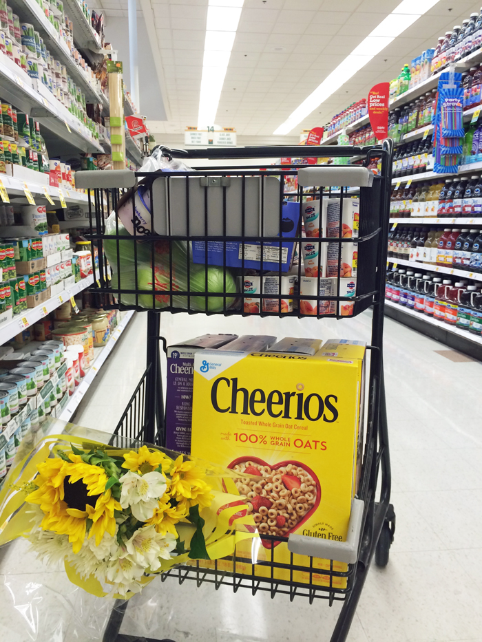 groceries cart with flowers and cereal