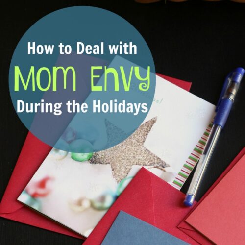 greeting cards on table with text overlay: How to Deal with Mom Envy During the Holidays.