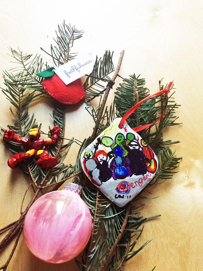 handmade christmas ornament on table with greenery