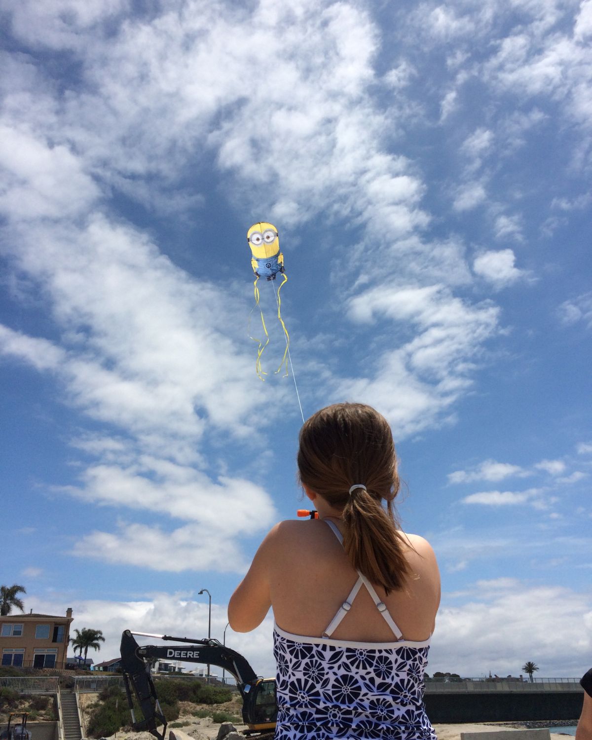girl flying kite.
