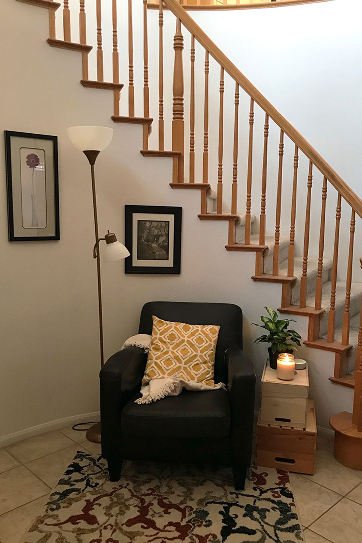 cozy armchair for reading near stairs.