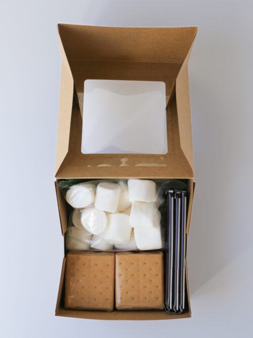 ingredients assembled in box to make a s'mores kit.