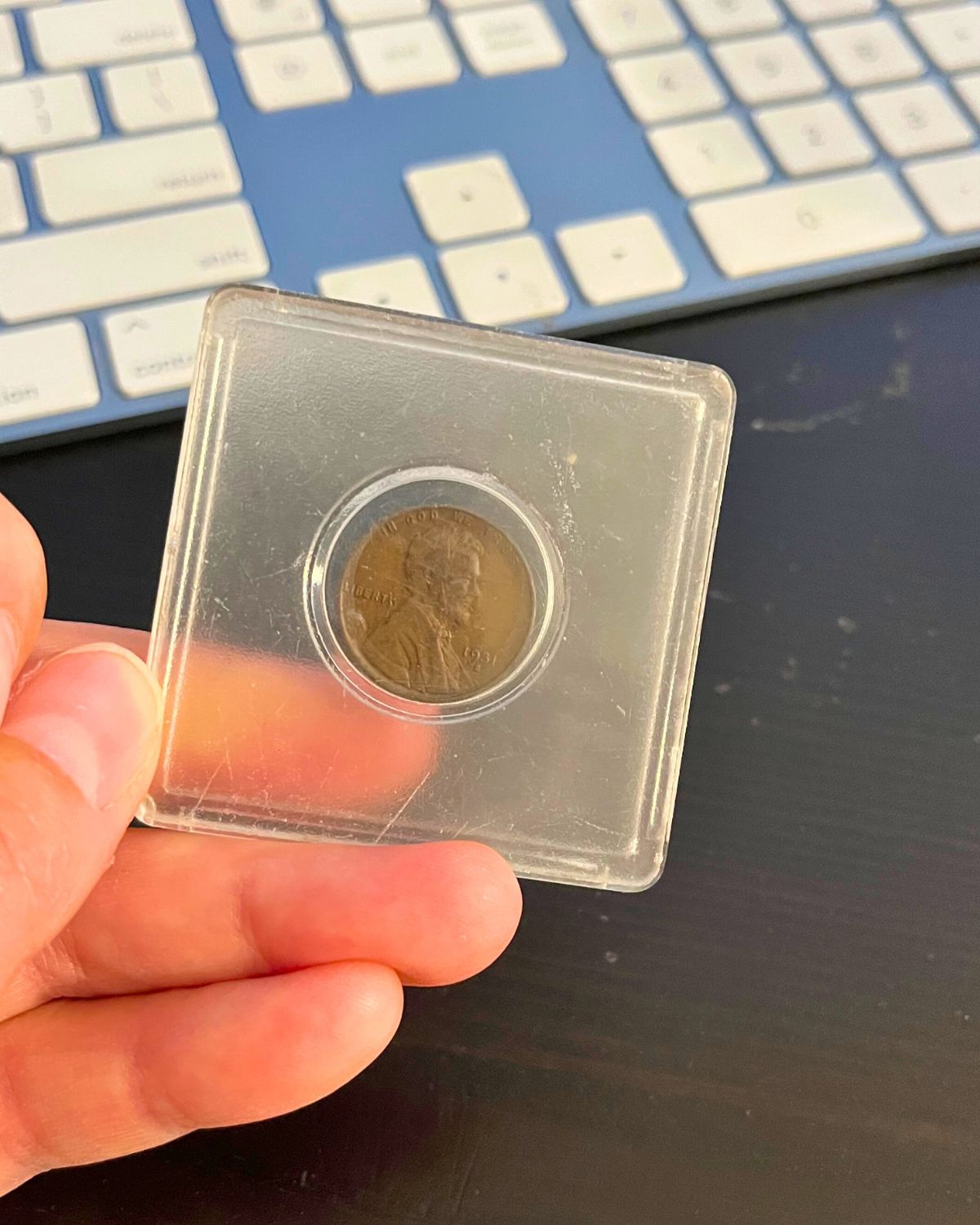 1931 wheat penny in plastic case.