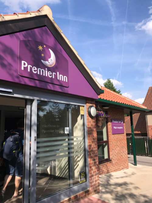 The brick front of a Premier Inn.