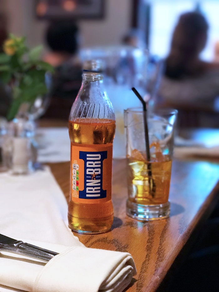 A bottle of Irn Bru on a table