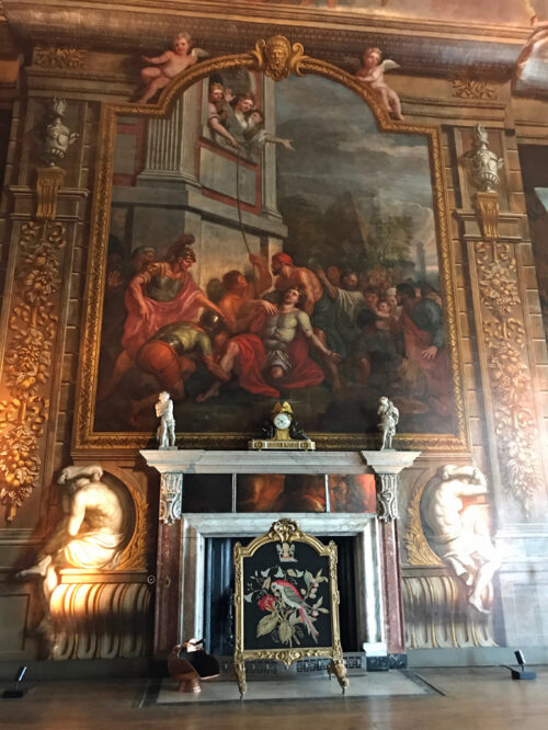 A painting over a fireplace at Burghley House.